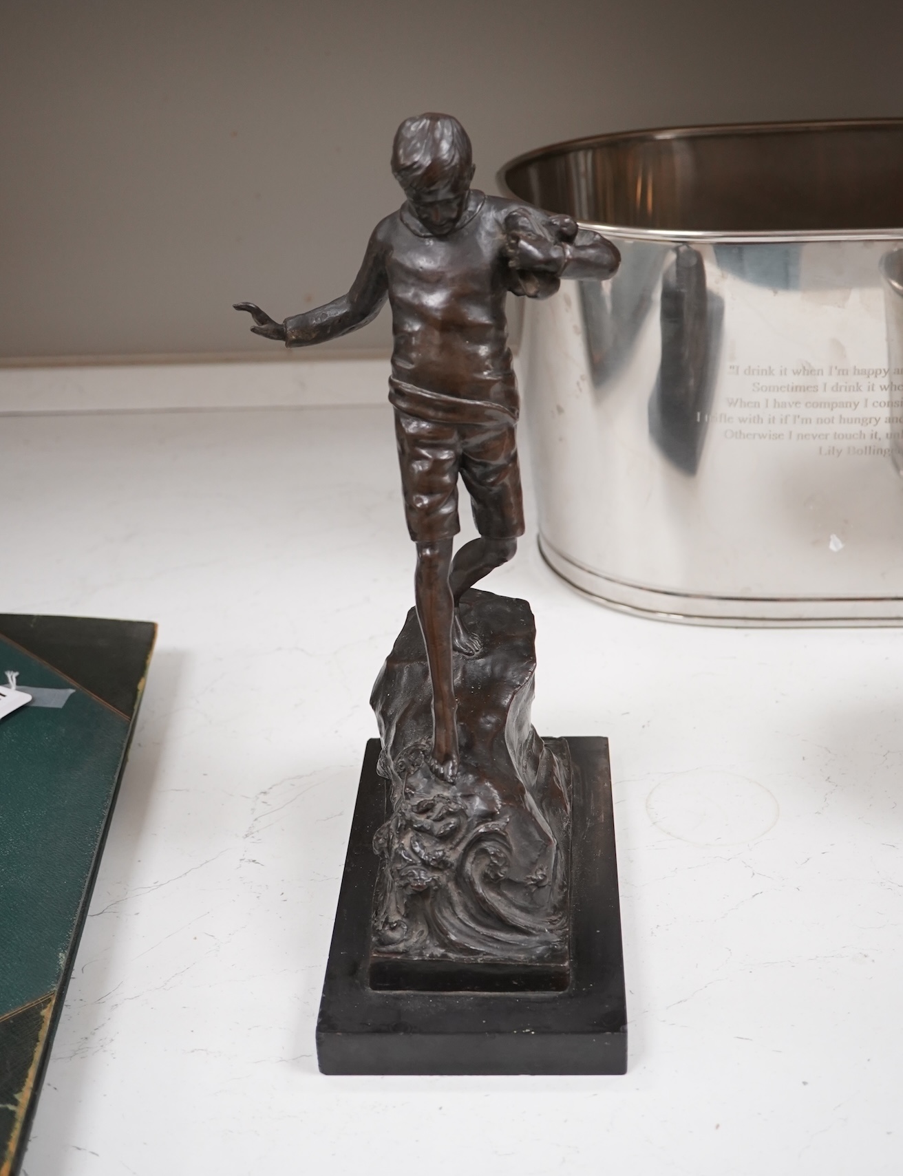 Lorna Adamson (British b.1894-?), an early 20th century bronze figure of a boy, signed and dated 1913, on marble base, 36cm. Condition - nibbles to base, otherwise good